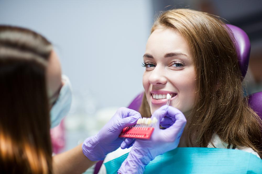 woman smiling while getting veneers in havertown